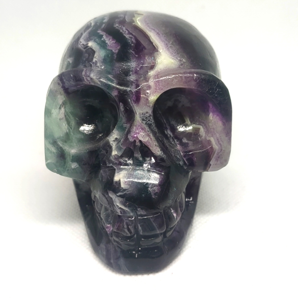 Stunning rainbow 🌈🌈 fluorite crystal carved skull